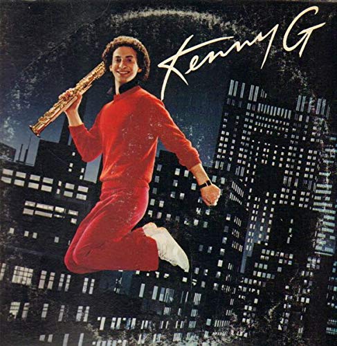 Album cover with a person in a red outfit holding a saxophone against a cityscape background, featuring the name 'Kenny G'.