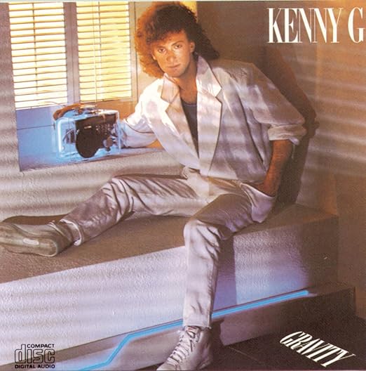 Album cover featuring a person sitting on a window sill with a radio, titled 'Gravity' by Kenny G.