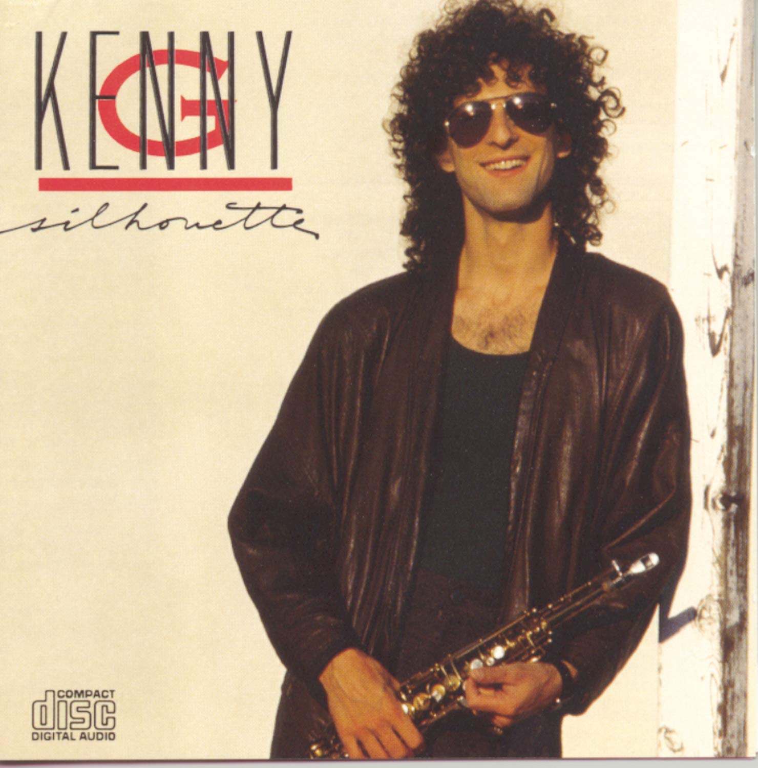 Album cover featuring a person holding a saxophone with 'Kenny' and 'Silhouette' text.