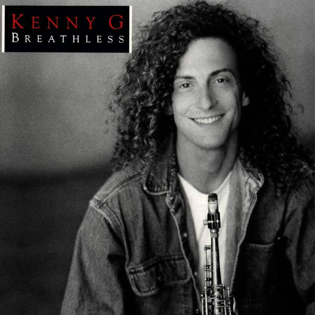 Black and white photo of a man with long curly hair holding a saxophone, with 'Kenny G Breathless' text at the top.
